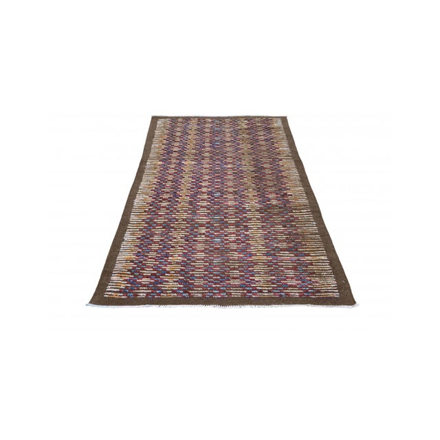 Hand knotted unique rug newly made in Afghanistan using hand spun wool.