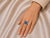Bold 14K white gold ring featuring blue topazes, sparkling diamonds, and vibrant turquoise cabochons. Top measures 3/4inch...