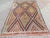 This beautiful, traditional vintage, flatweaved Turkish kilim rug is approximately 60 years old. It is handmade of very...