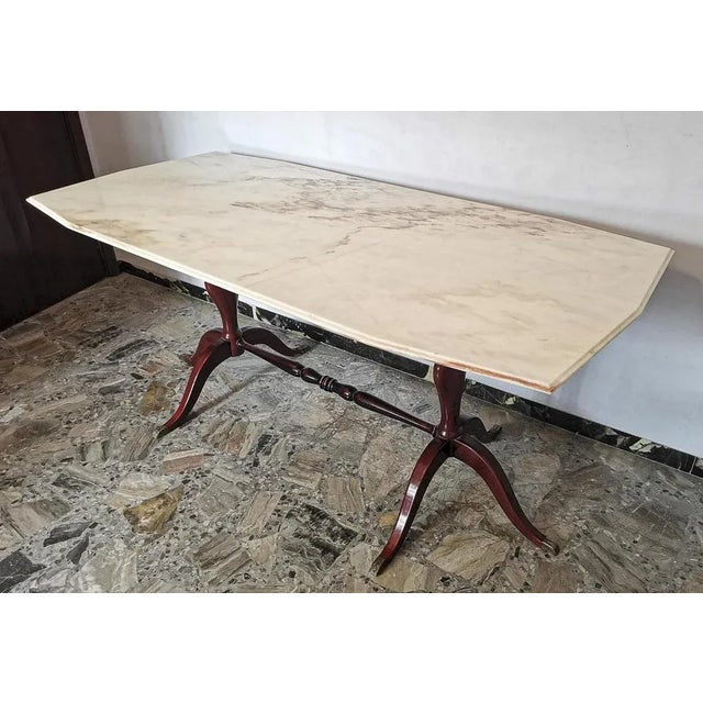 Table base in polished red painted wood and brass ferrules shaped top in pink marble from portugal italy 1960 measurements...