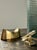 Desk accessories in cast brass; a set of two heavyweight functional pieces to add to a brass collection. A useful tape...