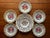 Decorative hand painted lattice work plates and center piece 1 Center piece 10,5 diameter 5 plates 7,5 diameter