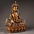 This is a finely crafted antique gilt bronze sculpture of Ksitigarbha Bodhisattva, a revered figure in Tibetan Buddhism....