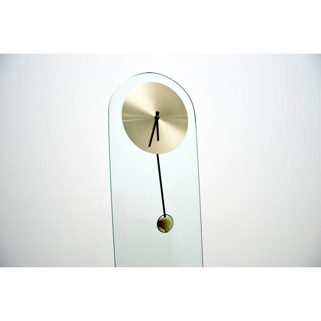 A stylish and incredibly rare vintage glass and brass clock by Leon Rosen for Pace Collection. This was made in the USA,...