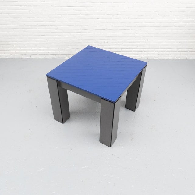 Eye-catching German dining table from the 1980s, featuring a bold postmodern design. The sturdy table has a deep blue,...