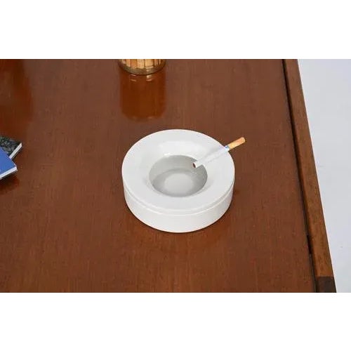 Wonderful Mid-Century round ceramic "Barbados" ashtray designed by Angelo Mangiarotti for Danese Milano. This stylish...