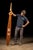 Monumental handmade wooden fraternity paddle dated "FALL 89," featuring an elongated tapered blade, turned handle, and...