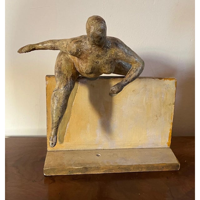 Roger Owen Prince (American 1924 - 2021) modernist figurative papier mache table sculpture. Female figure leaping over a...