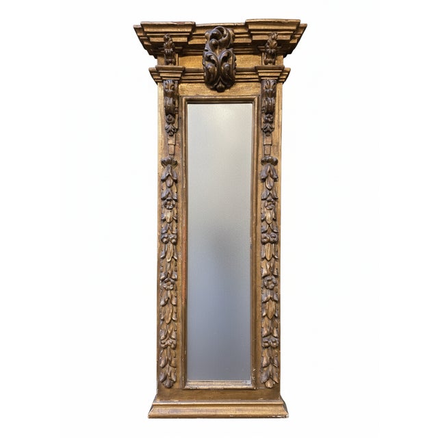 Italian Baroque style mirror in stuccoed and gilded wood, dating from the mid-19th century. The pediment is...