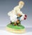 Excellent viennese art nouveau ceramic piece: blond boy sitting sideways on a rooster decorated with colourful flower...
