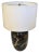 This vintage black ceramic lamp with hand-painted silver detail and has a new white drum shade. This lamp is in beautiful...