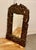 Heavily carved fruitwood mirror. A lovely piece from the east the 6” wide frame is intricately carved with leaves and...