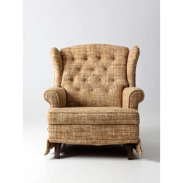 This is a vintage La-Z-Boy recliner circa 1970s. The classic recliner has a tan tweed design with tufted back. The chair...
