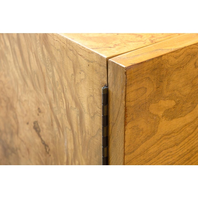 A vintage burlwood cube cabinet. This lovely 1970s side/end table features a full burlwood construction. Its beautiful...