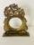 Hunters motive antique brass pocket watch stand. The inner opening is 3,5”.