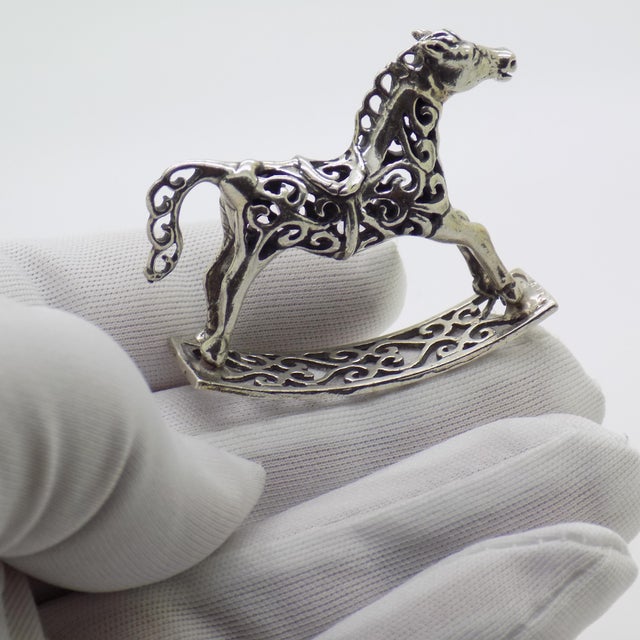 A charming vintage rocking horse miniature, handcrafted in Arezzo (Arezzo, AR, Tuscany, Italy) during the 1980s and 1990s....
