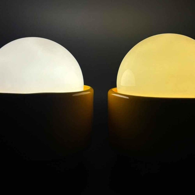 Traudl Brunnquell Yellow Pop Art Ceramic Table and Wall Lamp Pair, designed in 1977, with white glass shade and yellow...