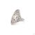 This estate ring, an early-twentieth-century antique design, centers on a 0.87-carat diamond in an old European cut, an...