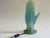 Resin hand in rare mint slash celadon green colorway. Serafini’s surrealist table lamp—part sculpture, part functional...