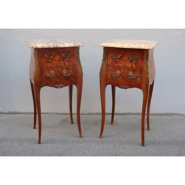 Antique Pair of french Louis XV style inlaid side tables or nightstands. Parisian cabinetmaker masterpiece work around the...
