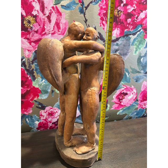 Two Angels sculted showing connectedness on a spiritual level. Love, Light and Companionship. Unknown Manufacturer.