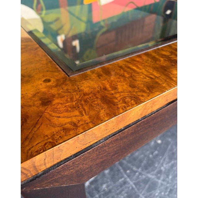 Century dining set comprised of a burl table with two smoked glass panel inserts, two additional burl leaves, 2 armchairs...