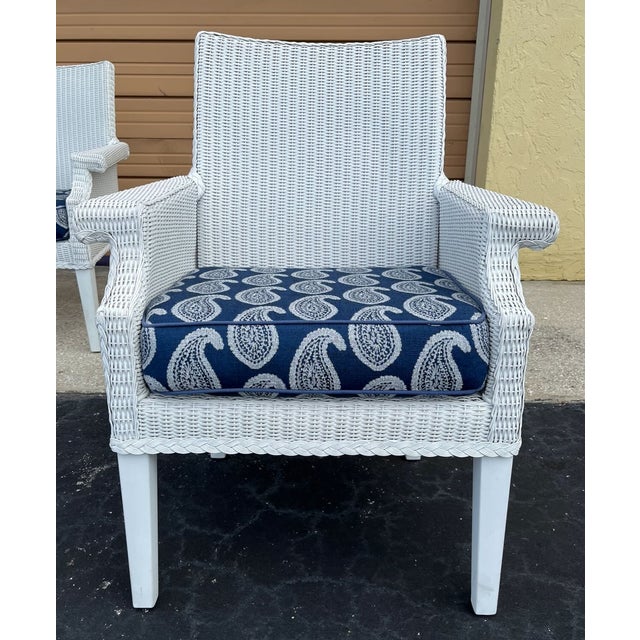 Pair of Lloyd Flanders Hampton collection wicker armchairs. Made of Lloyd Loom "wicker fabric" on corrosion resistant...