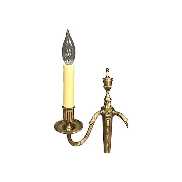 Pair of antique brass wall sconces. Natural dipped wax "candles". Completely rewired for US standards, using chandelier...