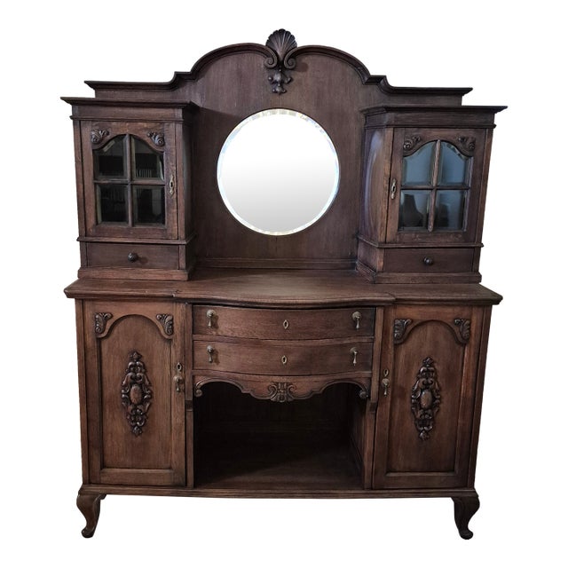 Late 19th-Century Victorian Hand-Carved Oak Buffet With a Beveled Mirror For Sale