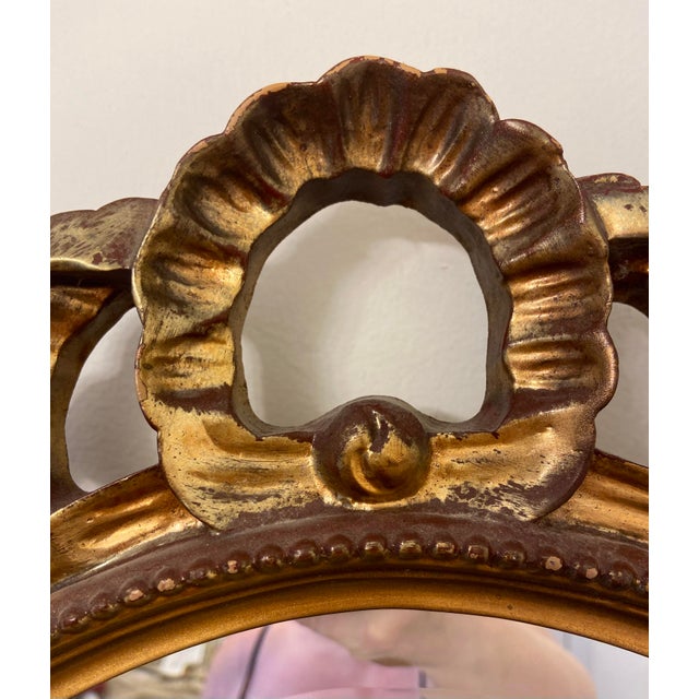 Early 21st Century Filigree Ornate Gilded Beveled Gold Bow Oval Wall