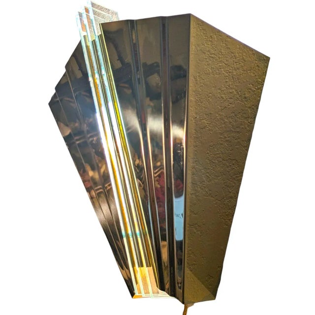 These stunning French Art Deco revival skyscraper style sconces were realized in the United States circa 1980. Resembling...