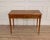 This refined Louis XVI–style desk is crafted in blond mahogany and exemplifies the elegance and symmetry associated with...