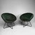Stylish Lucena lounge chair with an elegant retro-inspired design, upholstered in deep green velvet and set on a slim...