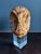 Vintage Mid 20th Century carved alabaster owl with yellow green eyes on lucite stand. Measures approximately 7.5” tall,...