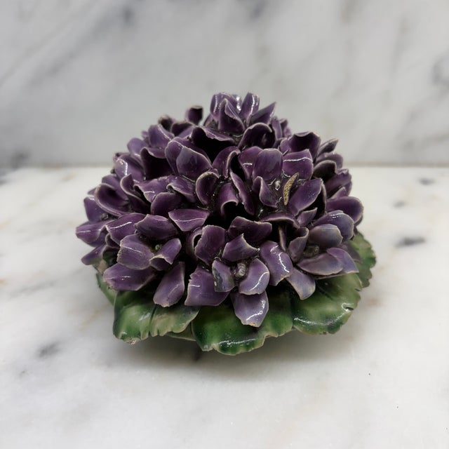 Beautiful antique French porcelain flower bouquet composed of densely layered, individually modeled deep purple violet...