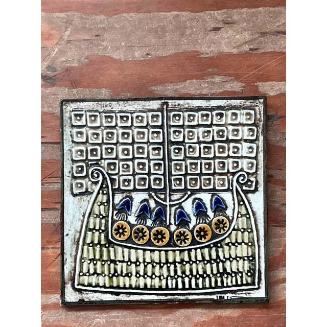 This exceptional collection comprises four vintage ceramic art tiles, each a masterpiece of textural high-relief studio...