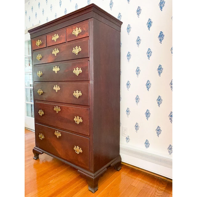 The rich patina of the original finish on this tall chest is something antique collector's dream about as it visible...