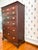 The rich patina of the original finish on this tall chest is something antique collector's dream about as it visible...