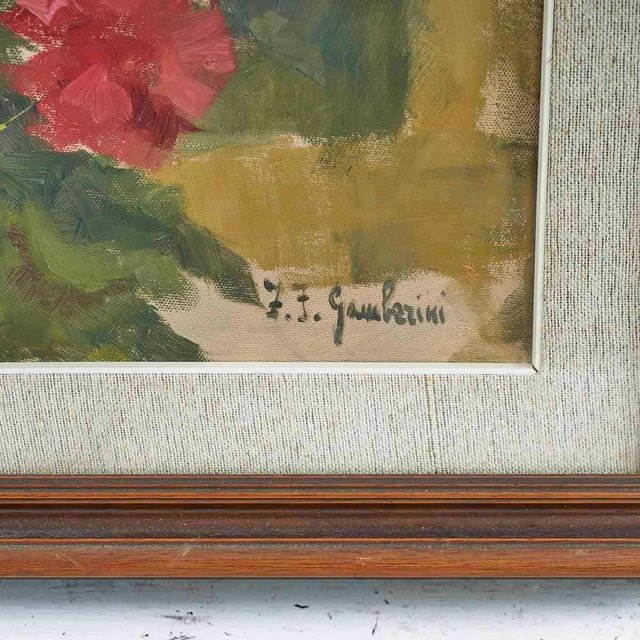 Oil on board of flowers signed by F. Gamberini, 1950s - 1960s.