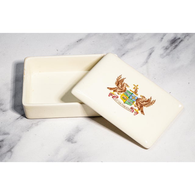 Celebrate the enduring elegance of English craftsmanship with this charming circa 1940 Wedgwood creamware trinket or...
