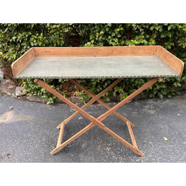 Fabulous zinc lined bar tray on folding stand. Rustic sun bleached wood, this was probably custom made. It’s long enough...