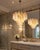 Pair Italian Murano glass chandeliers with alabaster wisteria glass tubes. The armor polished nickel supports 36 large...