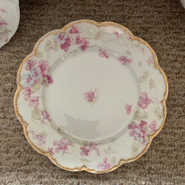 Pictured here is a custom curated collection of mismatch French Limoges dinner plates. Add a dash of romance to your table...