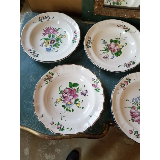 Beautiful hand painted late 20th century French Faience serving plates.