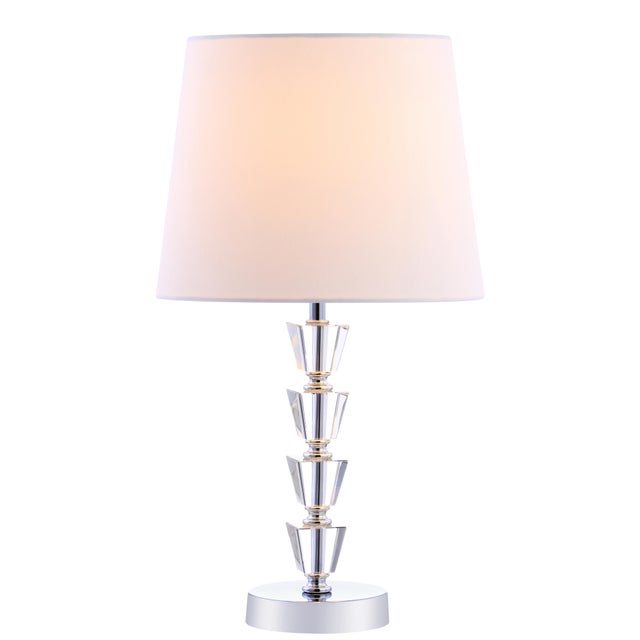 Add a delicate touch to the living room or bedroom with this contemporary table lamp. Finely crafted with a crystal clear...