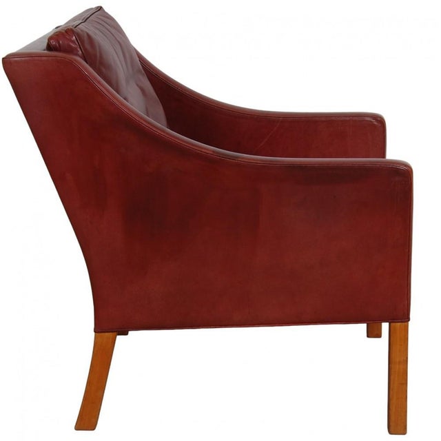 Børge Mogensen lounge chair model 2207 upholstered with the original Indian red aniline leather from Fredericia Furniture....