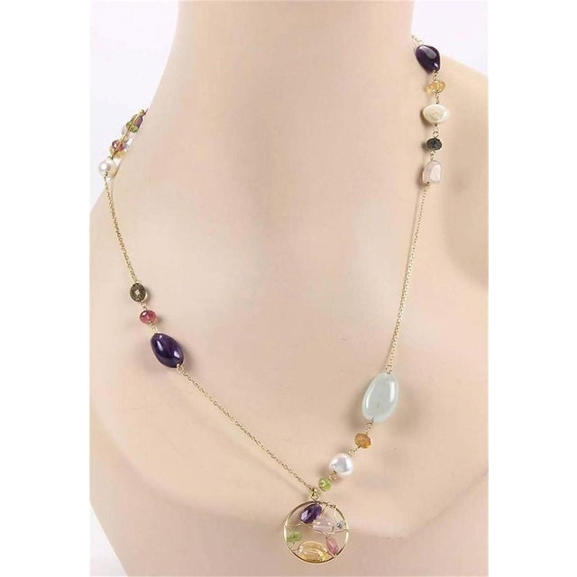 The Tous Garabato Multi Gemstone & Pearls 18k Yellow Gold Long 26" Necklace is a stunning piece of fine jewelry that...