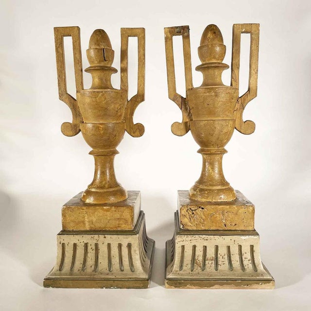 Pair of Empire Ivory and Gold Vases, 1800s. These two-handled vases are carved with Empire-style plant motifs and...