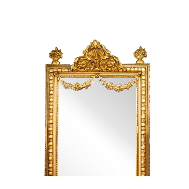 This Italian wall mirror dates to the early to mid-20th century, circa 1930s–1940s, and is executed in finely hand-carved...
