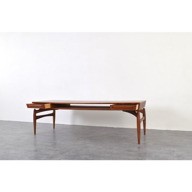 This teak coffee table was designed by Danish designer Johannes Andersen and manufactured in the 1960s by the Swedish...